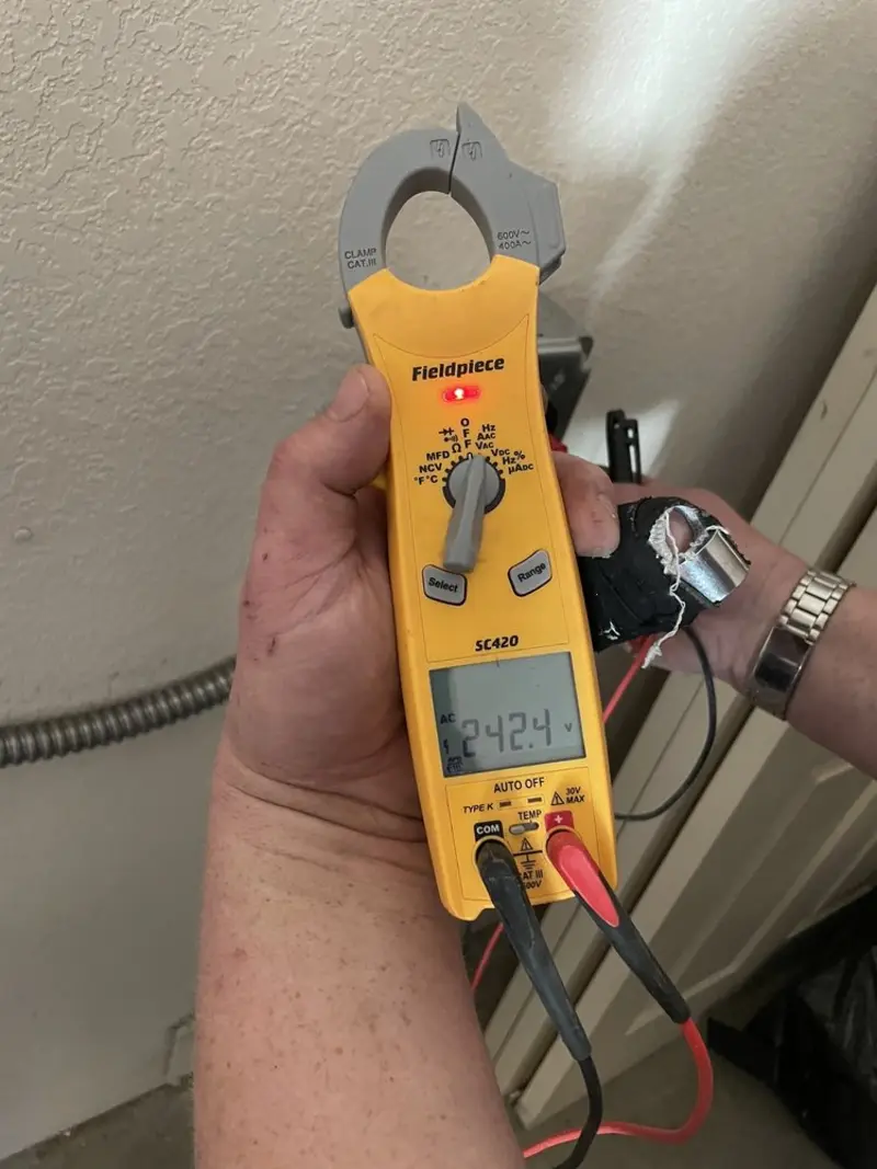 Voltage testing with clamp meter during Ceiling Fan Installation in Pistakee Highlands